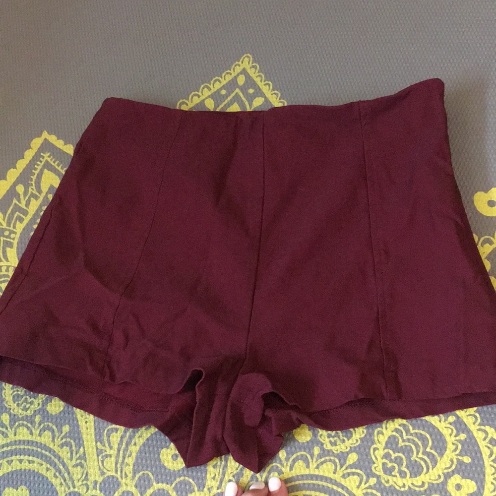 High waisted maroon shorts